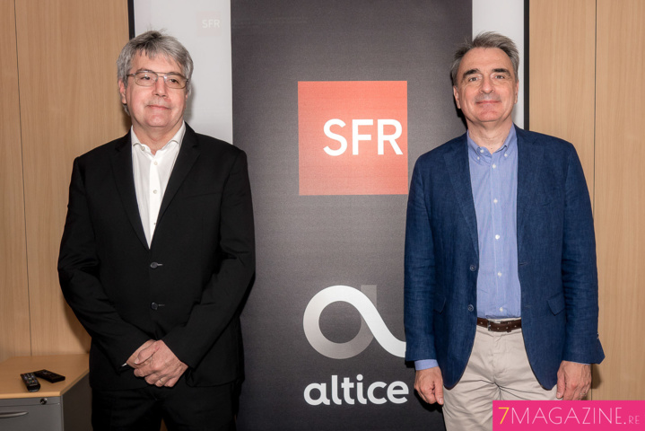 Patrick Josset et Michel Paulin devant les deux logos de l'entreprise. Dans un an, il ne restera que le logo Altice...