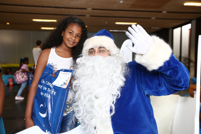 1000 Sourires <br>Noël avec le Père Noël Bleu